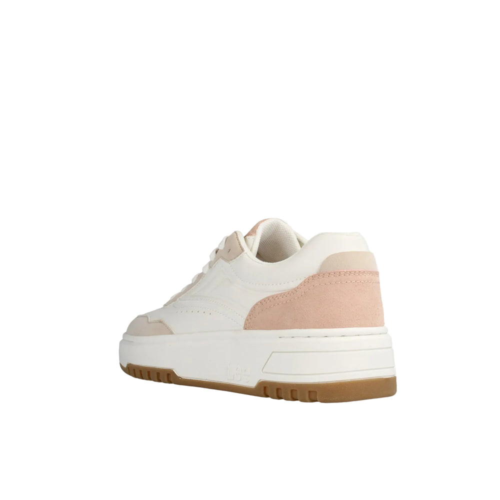 White sneaker with pink accent on a light gray background