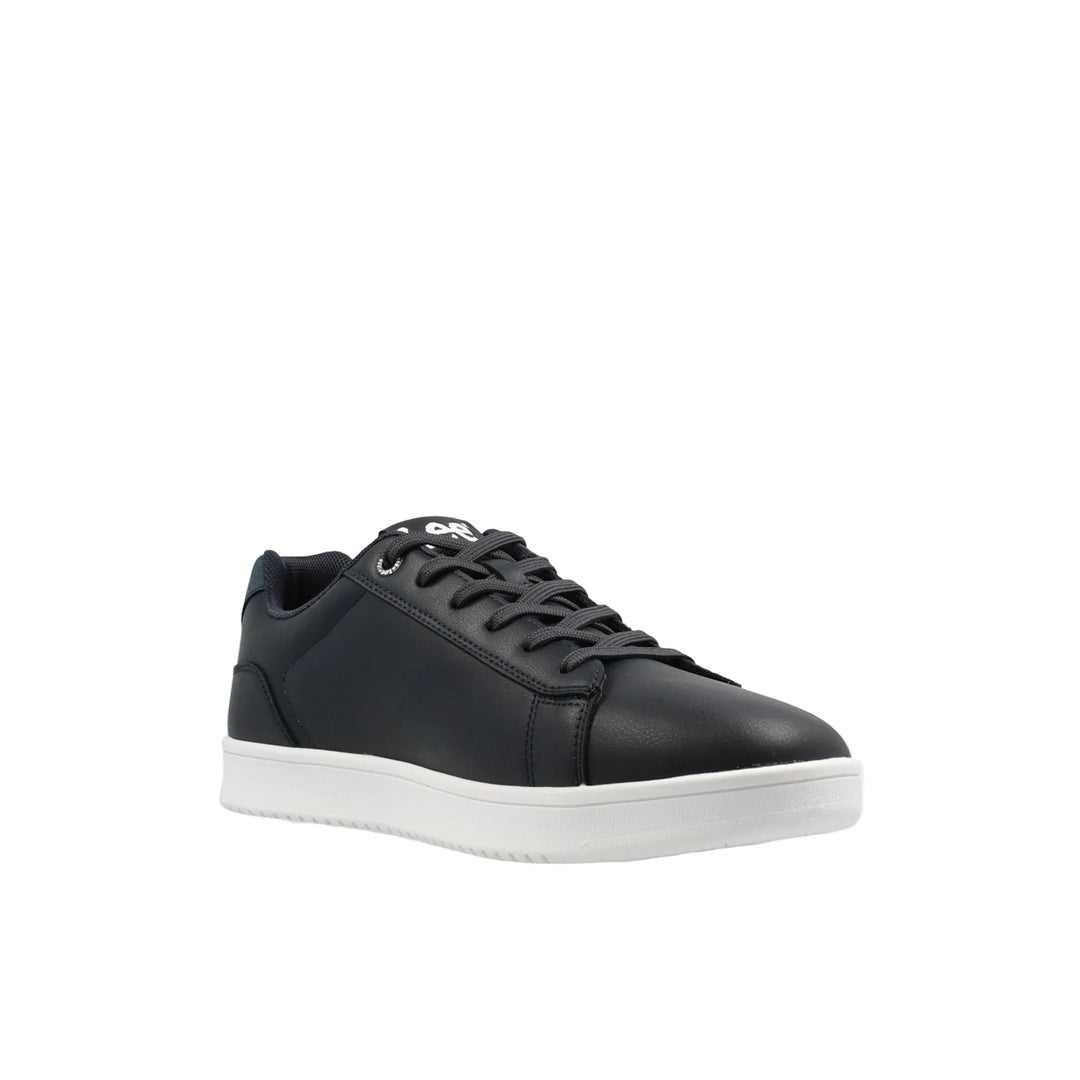 Black sneaker with a white sole on a light gray background