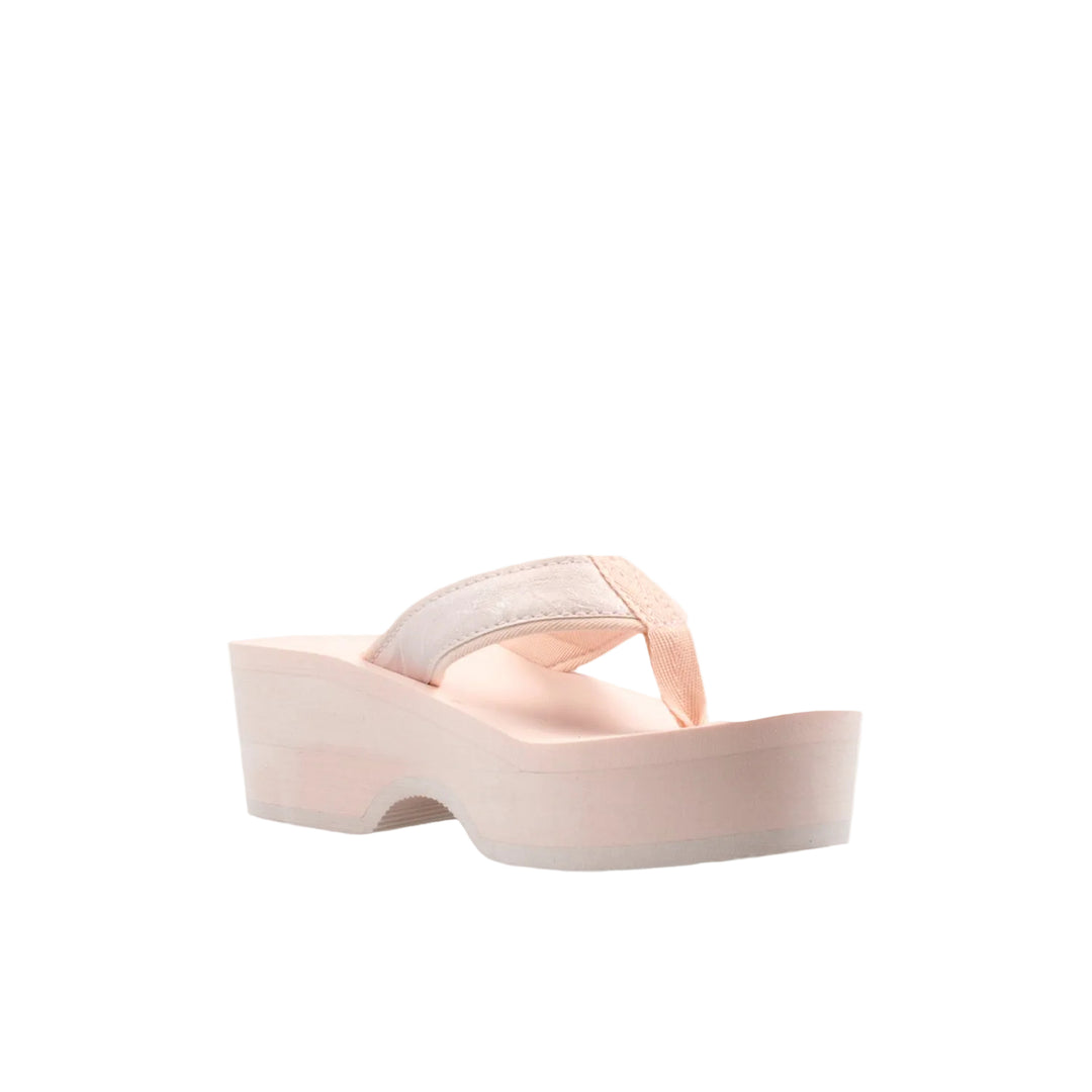 Pink clog sandal on a white background