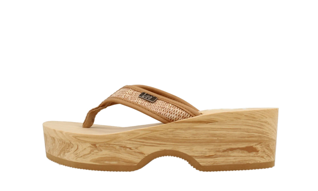 Wooden wedge sandal with a woven strap on a white background