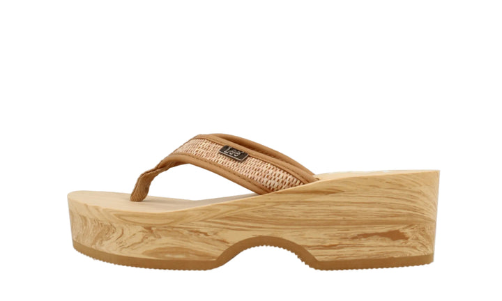 Wooden wedge sandal with a woven strap on a white background