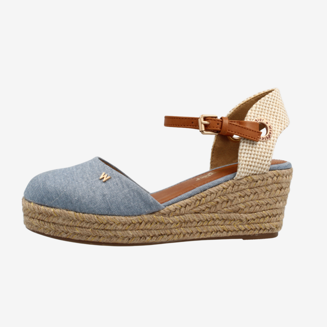 Denim wedge sandal with brown strap on a white background