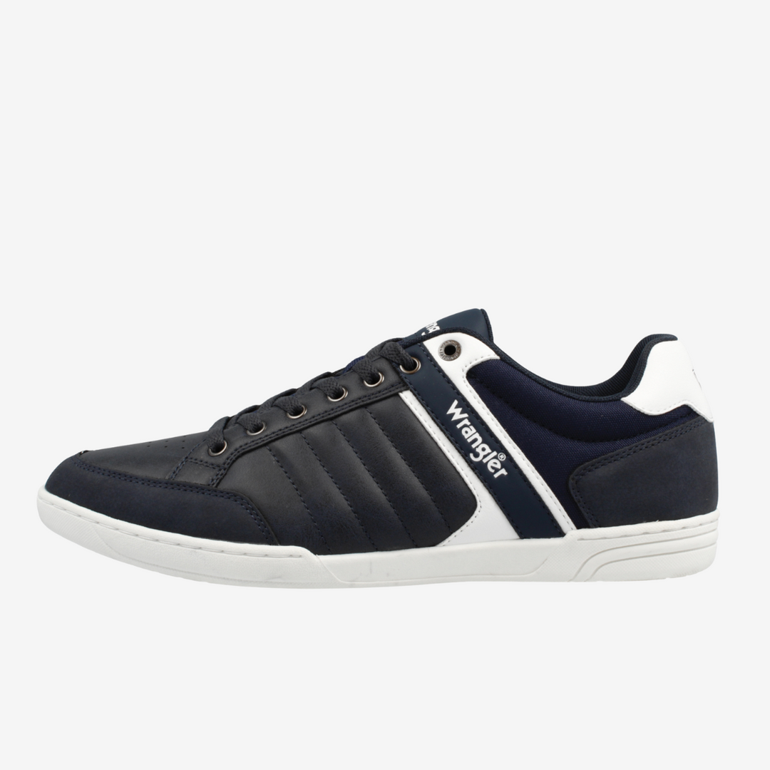 Black and white sneaker with 'Wrangler' branding on a white background