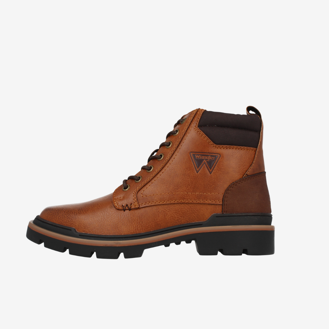 Brown leather boot with black sole on a white background