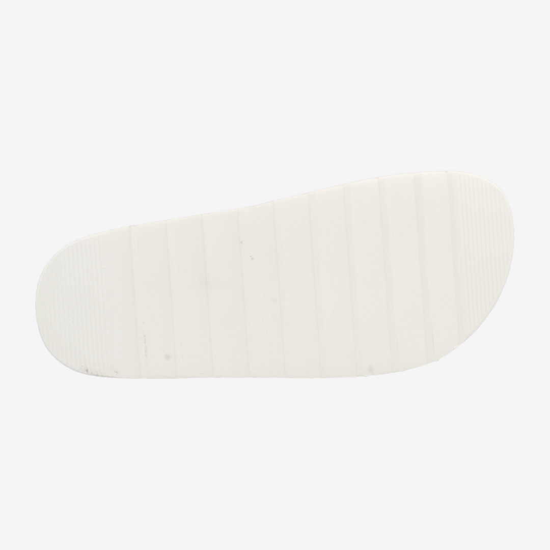White oval dish on a light beige background