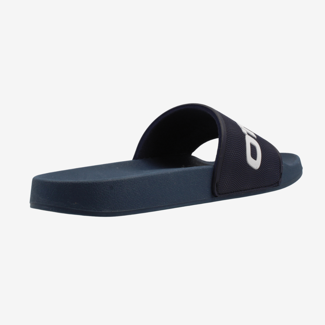Navy slide sandal with a logo on a light gray background