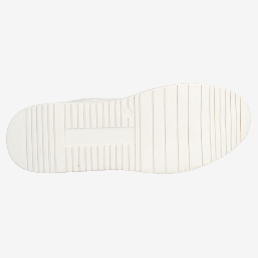White shoe sole with textured pattern on a white background