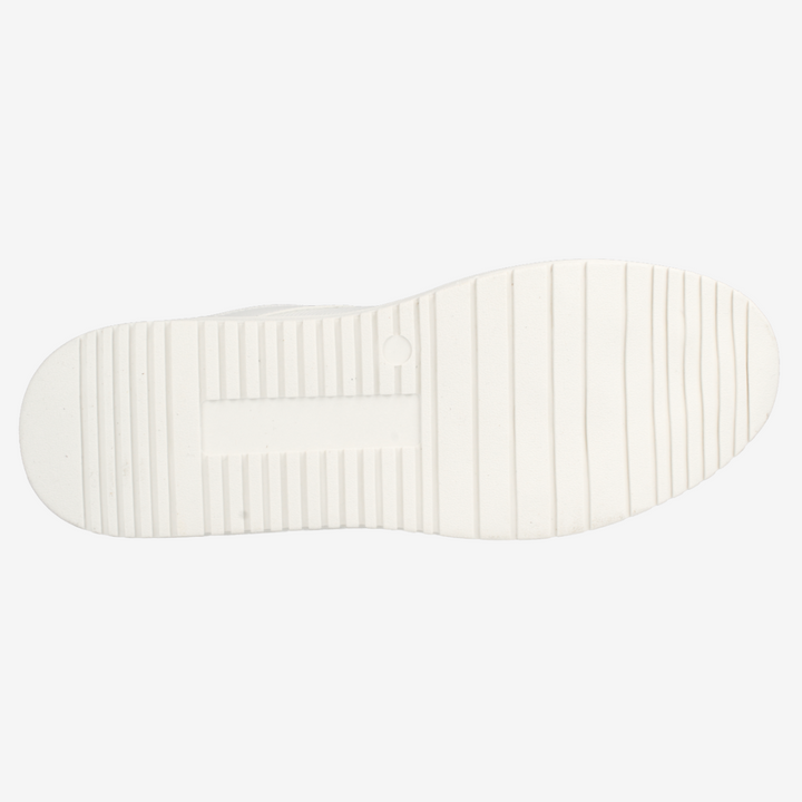 White shoe sole with textured pattern on a white background