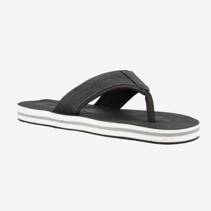 Black sandal with white sole on a light gray background