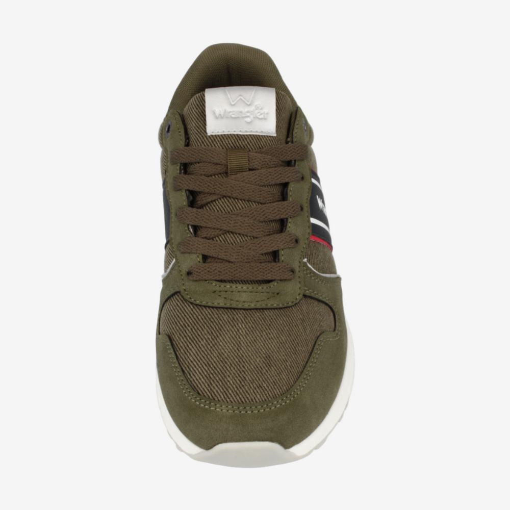 Green sneaker with white sole on a white background