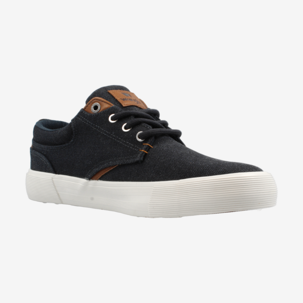 Black sneaker with white sole on a light gray background