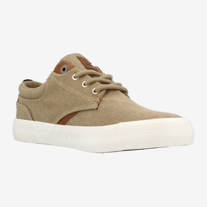 Tan sneaker with white sole on a light gray background