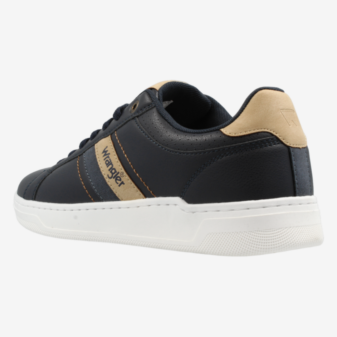 Black sneaker with beige accents on a white background