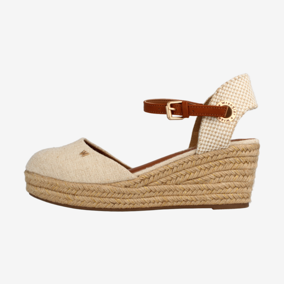 Beige wedge sandal with a brown strap on a white background