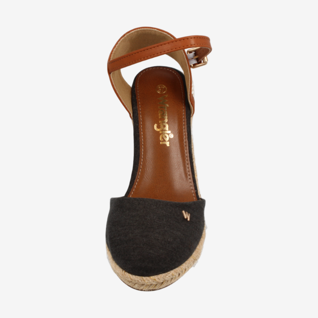 Black espadrille sandal with brown sole on a white background