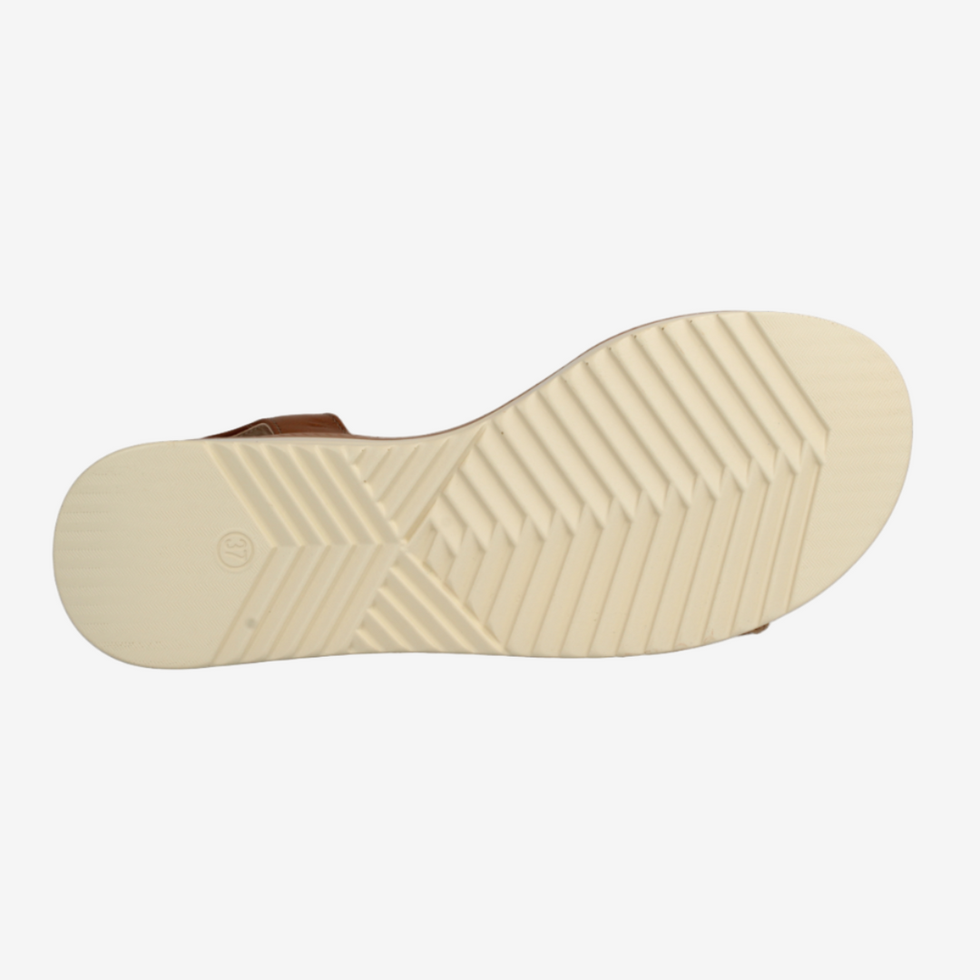Beige sole of a shoe on a white background