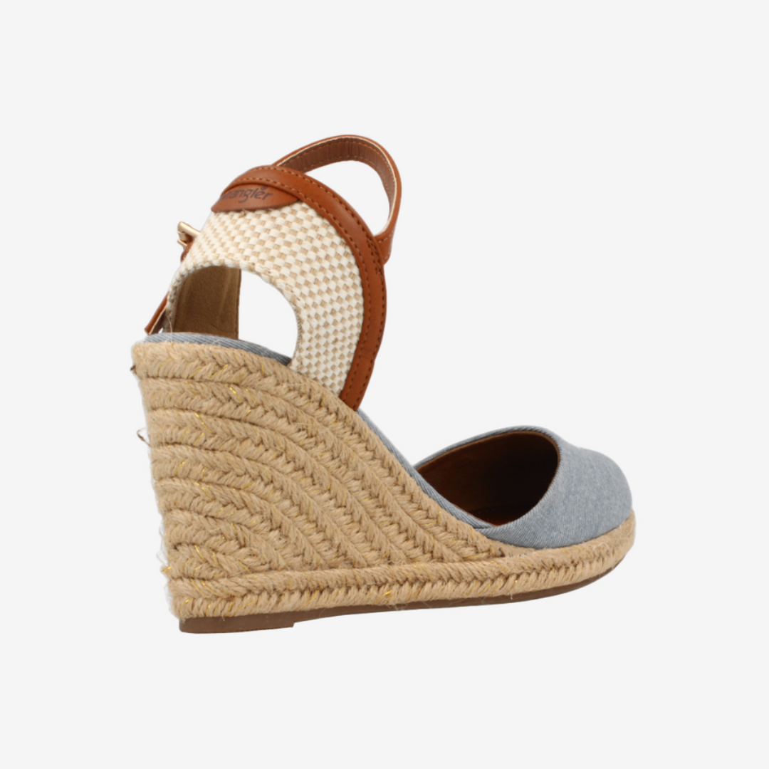 Wedge sandal with jute sole and brown strap on a white background