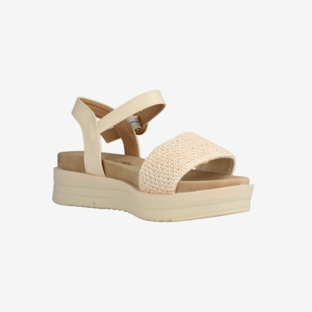 Beige sandal with platform sole on a white background