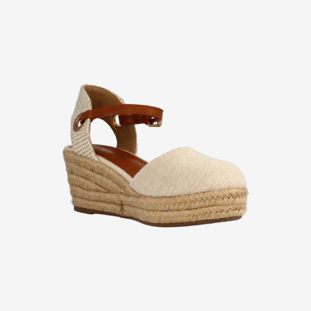 Beige wedge sandal with brown sole on a white background