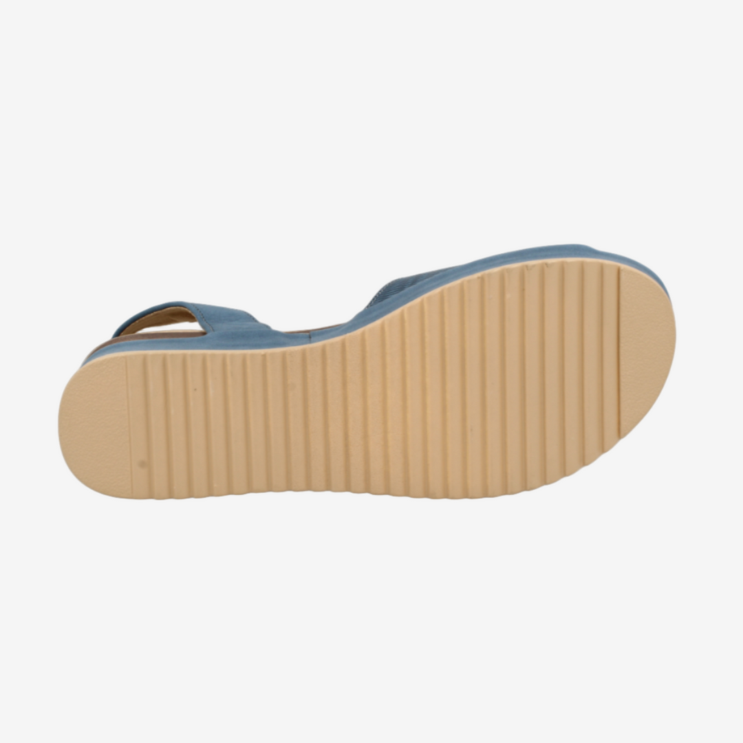 Sole of a shoe with a textured surface on a white background
