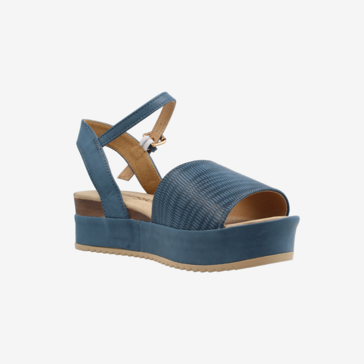 Blue wedge sandal on a white background