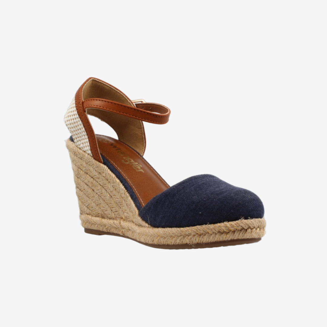 Navy wedge sandal with brown strap on a white background