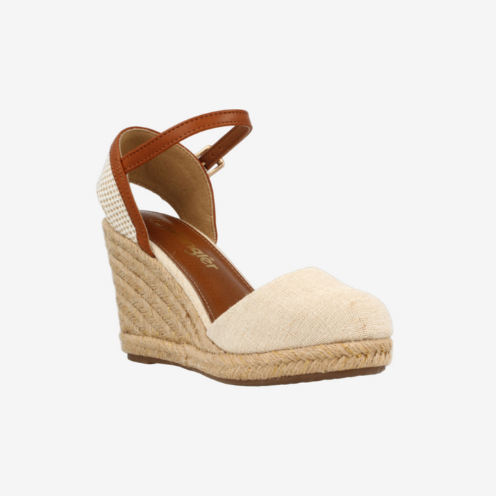 Beige wedge sandal with brown strap on a white background
