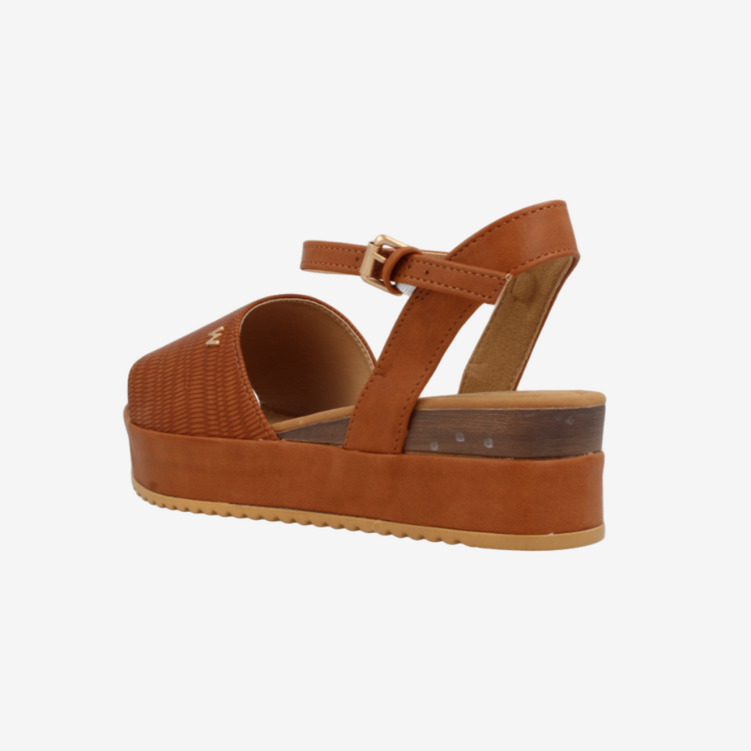 Brown platform sandal on a white background
