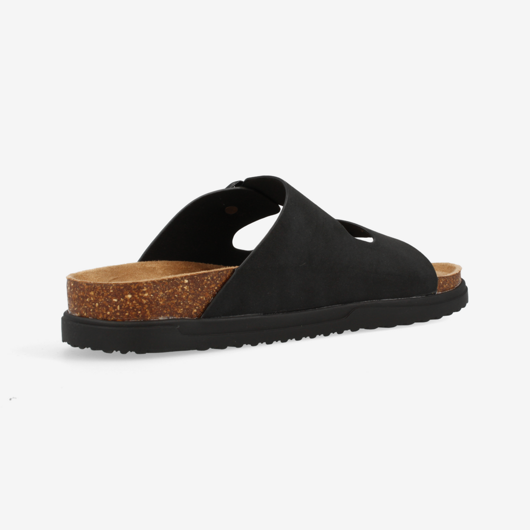 Black sandal with cork sole on a white background
