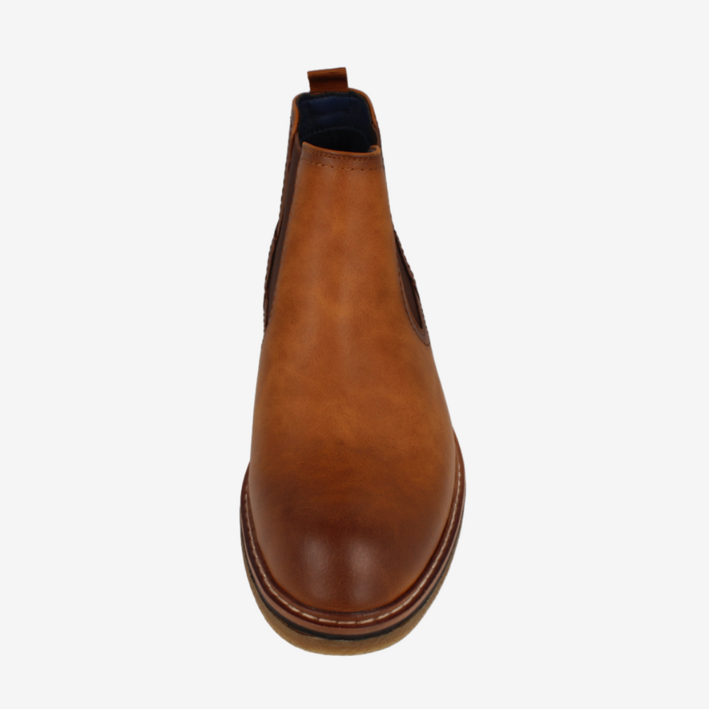 Brown leather boot on a white background