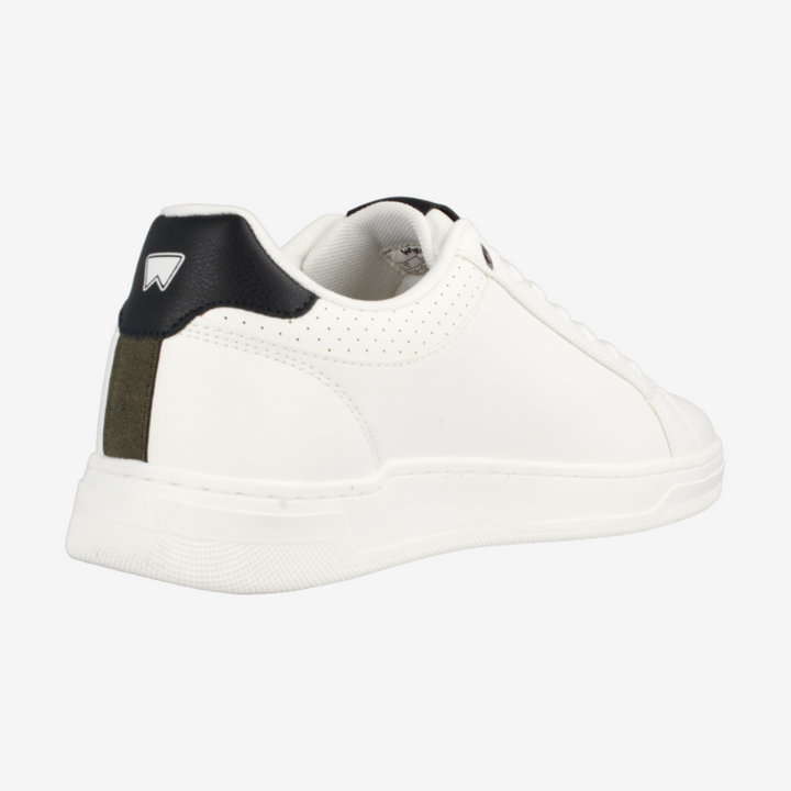 White sneaker with black and green accents on a white background