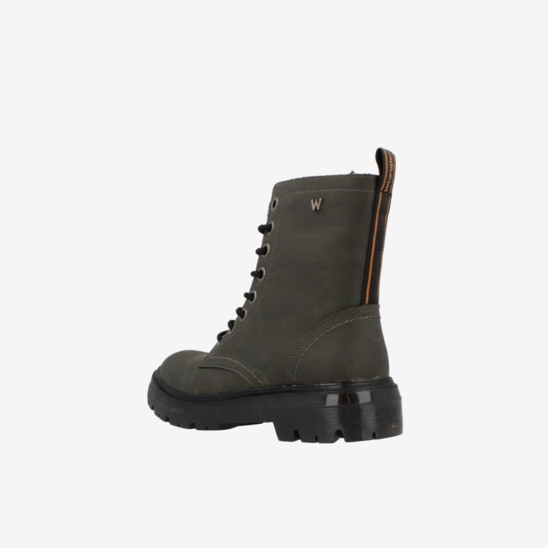 Dark green boot on a white background