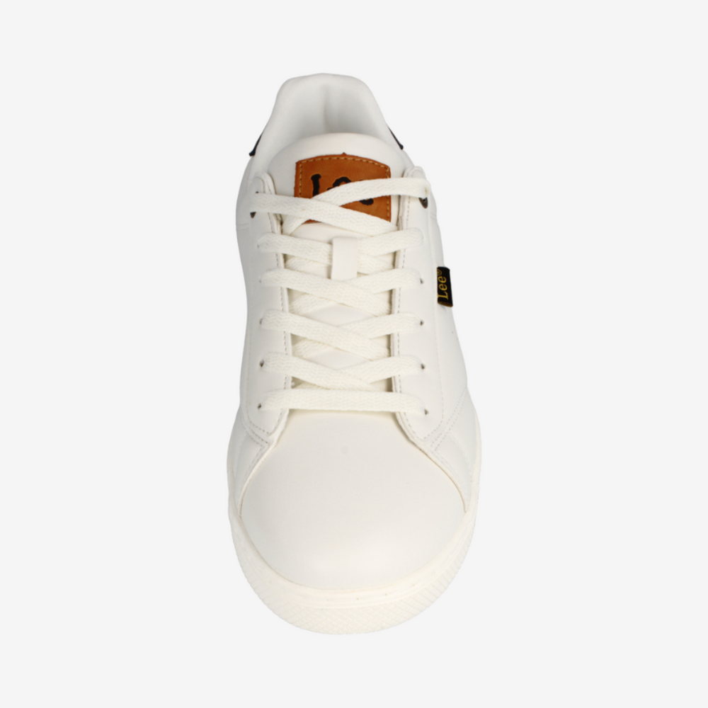 White sneaker with brown accents on a white background
