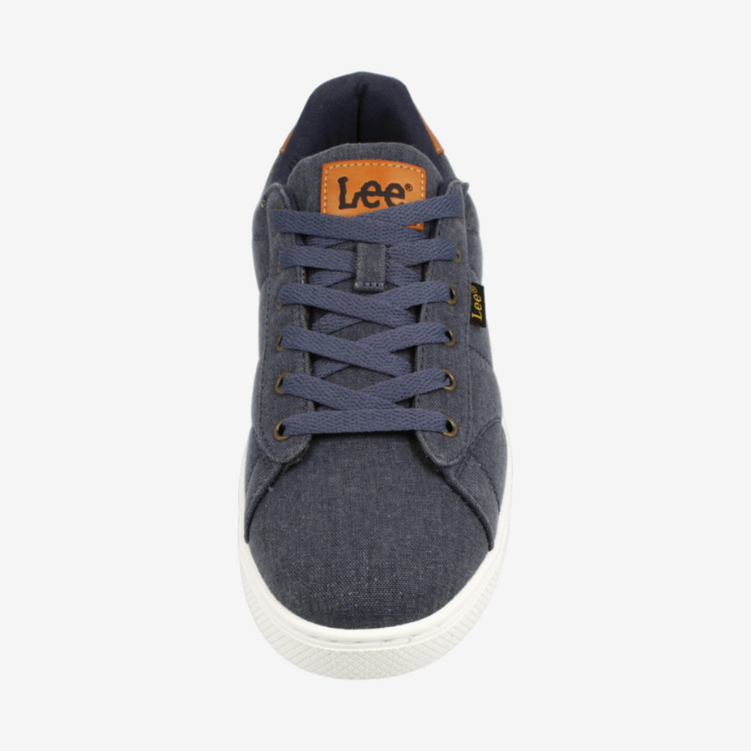 Blue denim sneaker with a visible brand logo on a white background
