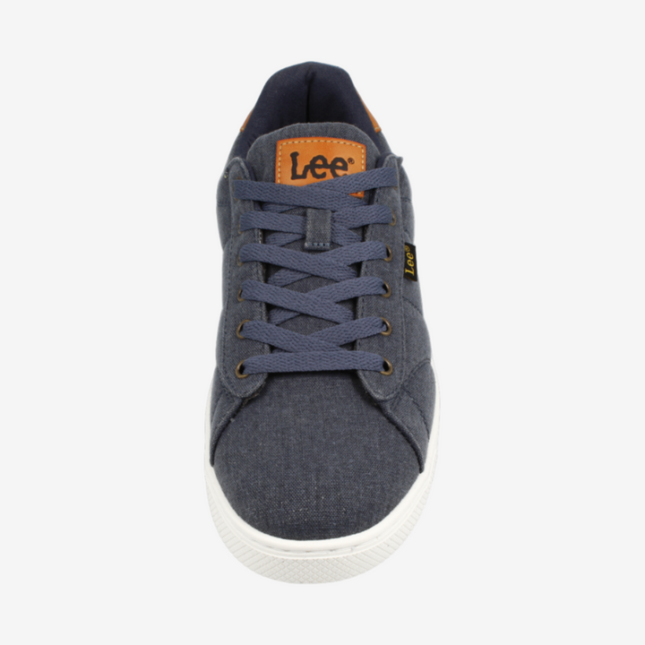 Blue denim sneaker with a visible brand logo on a white background