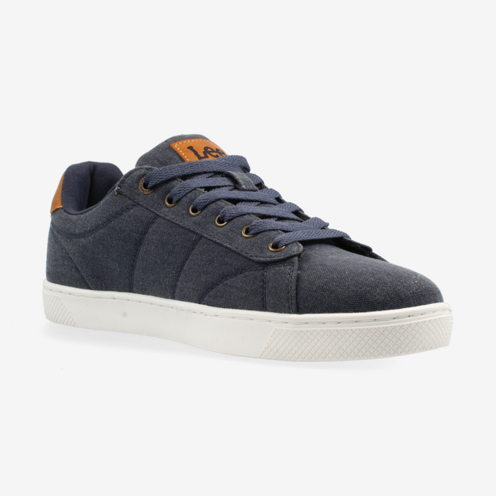 Navy blue sneaker with white sole on a light gray background