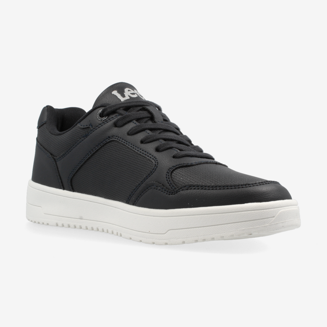 Black sneaker with white sole on a light gray background