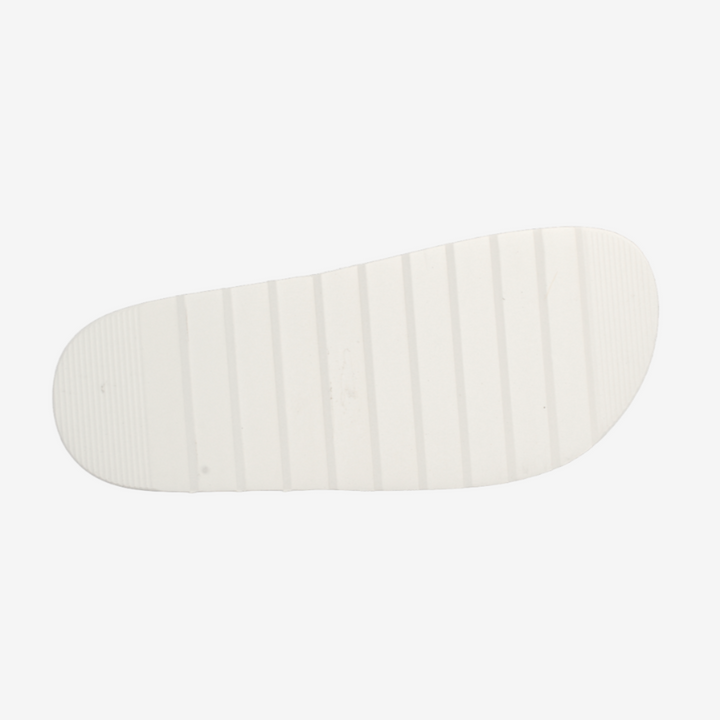 White shoe sole with striped pattern on a white background