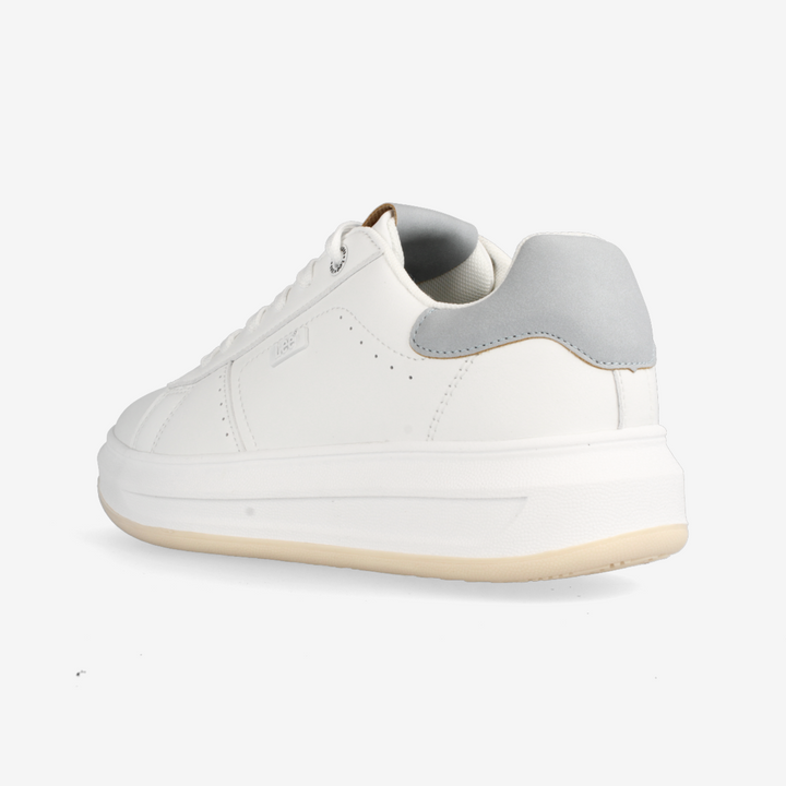 White sneaker with a gray sole on a white background