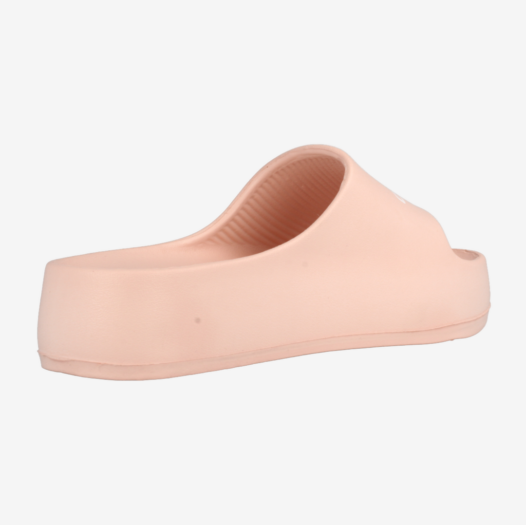 Single peach-colored slip-on shoe on a white background