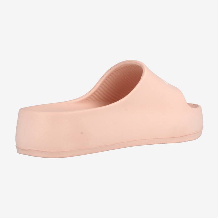 Single peach-colored slip-on shoe on a white background