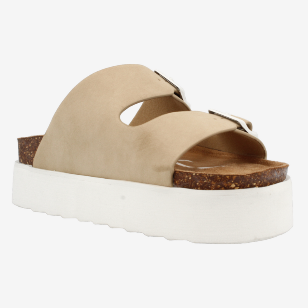 Beige sandal with a white sole on a white background