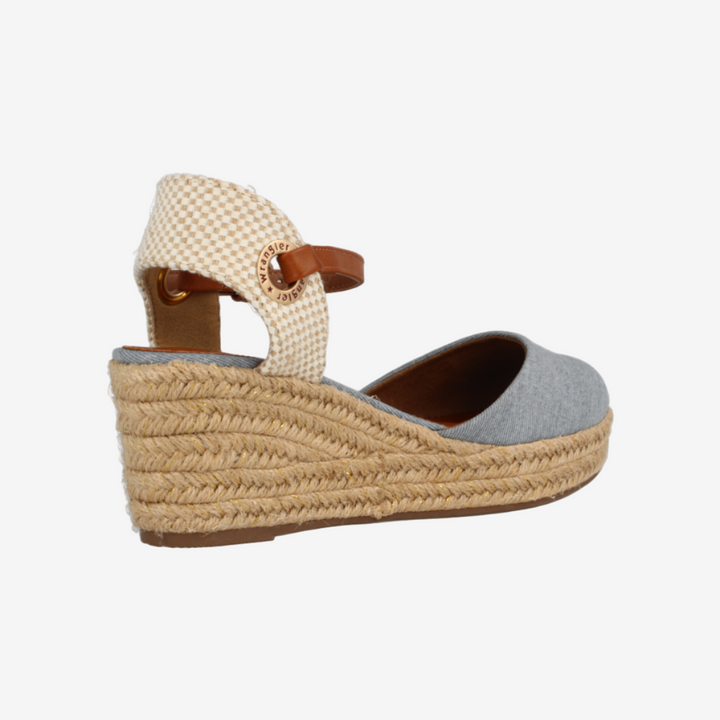 Woven wedge sandal on a white background