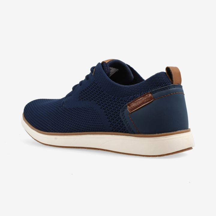 Navy blue sneaker with brown accents on a white background