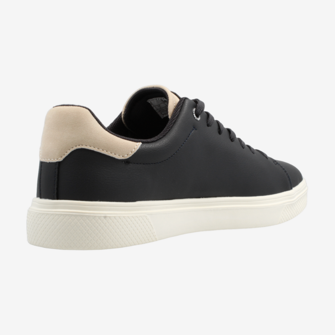Black and beige sneaker on a white background