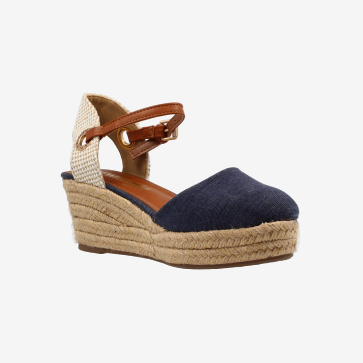Navy wedge sandal with jute sole on a white background
