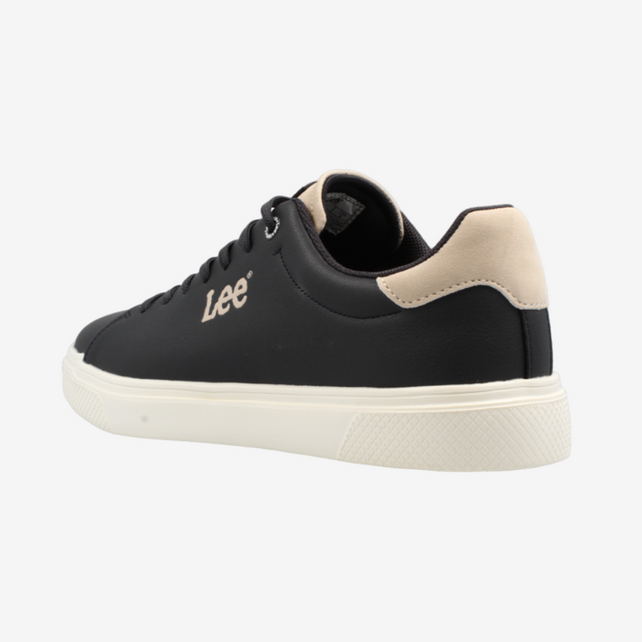 Black sneaker with beige accents on a white background