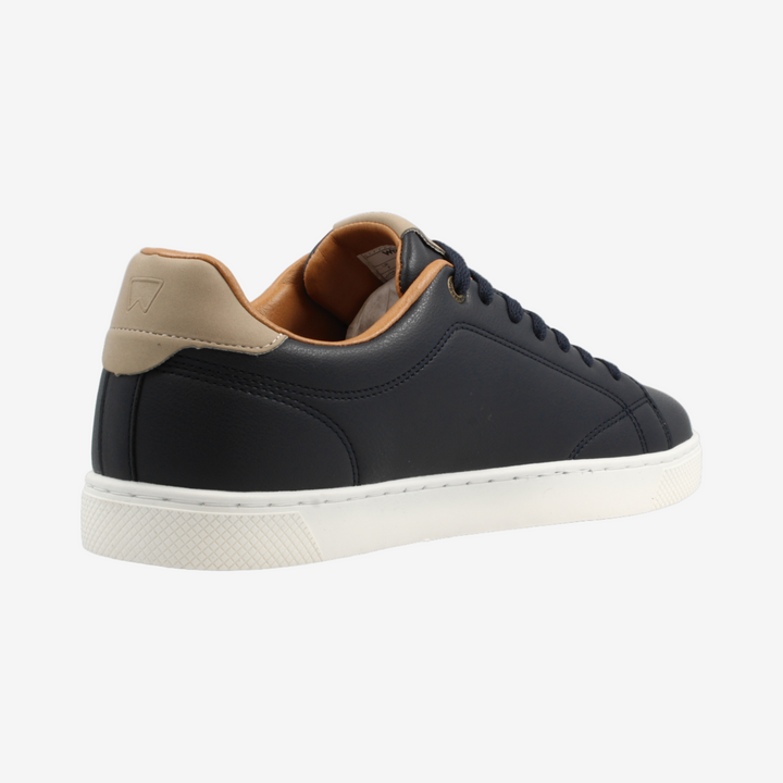 Black sneaker with beige accents on a white background
