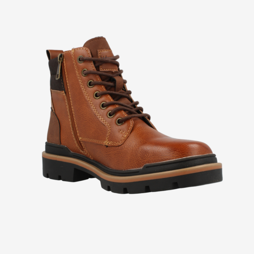 Brown leather boot with black sole on a white background