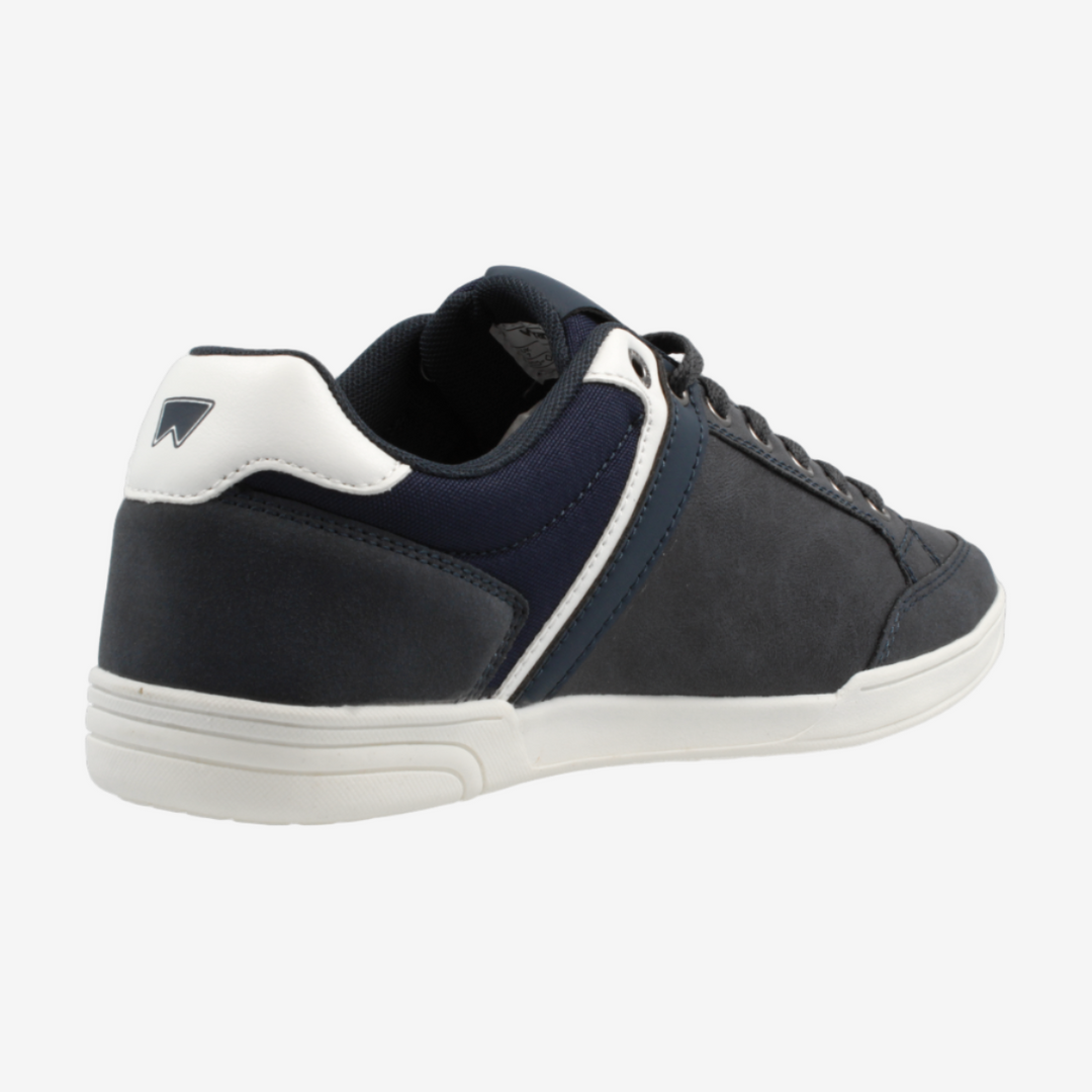 Navy and white sneaker on a light gray background